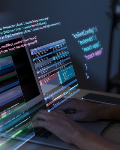 programming-background-with-person-working-with-codes-computer